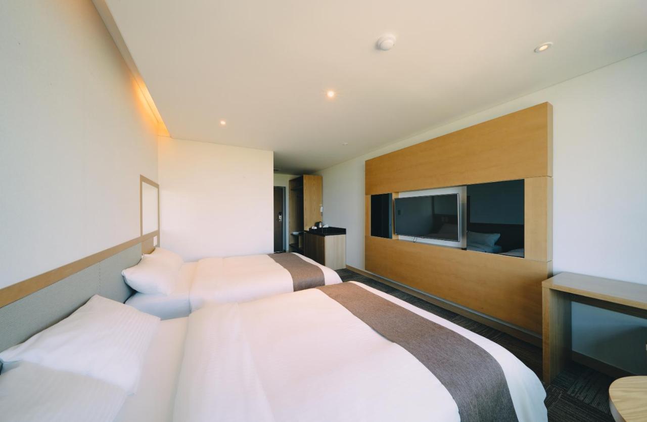 Jeju Poong Gyung Hotel Seogwipo Ruang foto