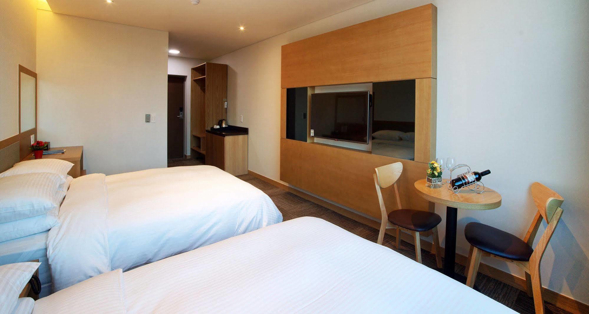 Jeju Poong Gyung Hotel Seogwipo Bagian luar foto