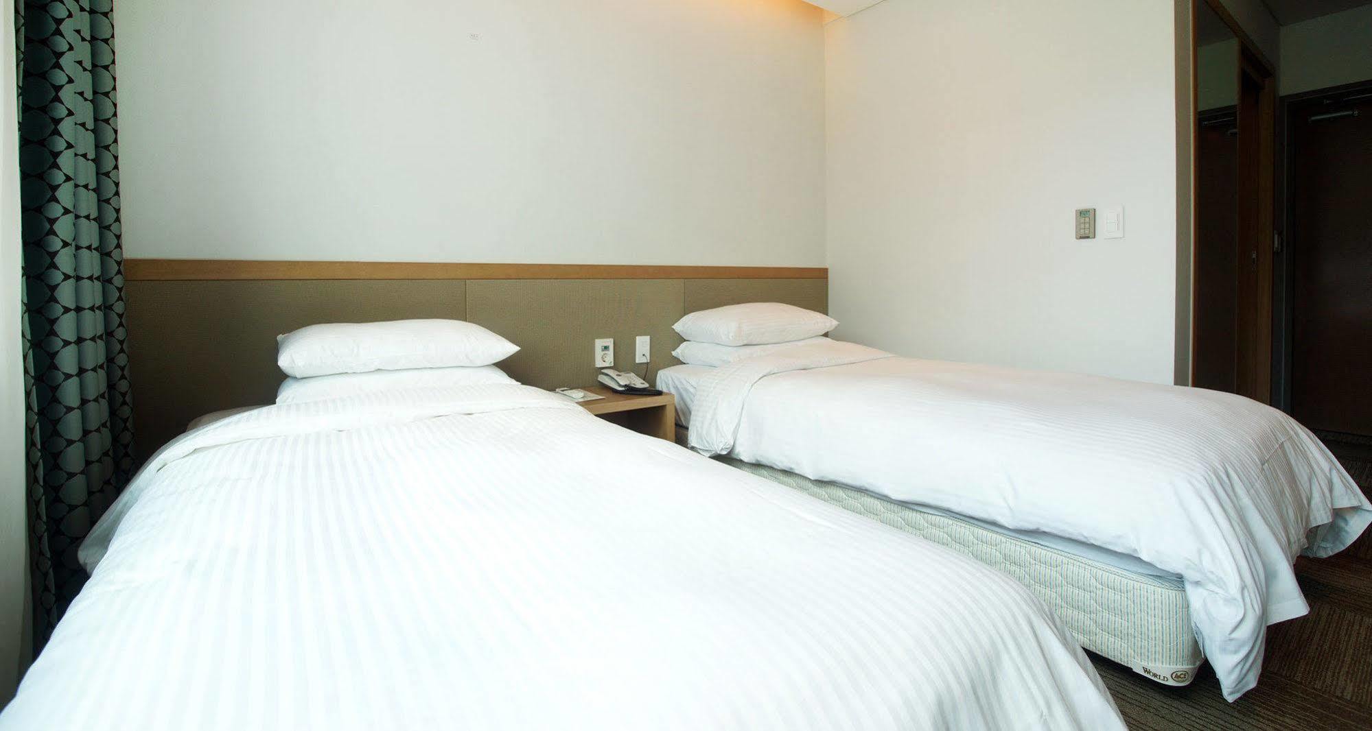 Jeju Poong Gyung Hotel Seogwipo Bagian luar foto