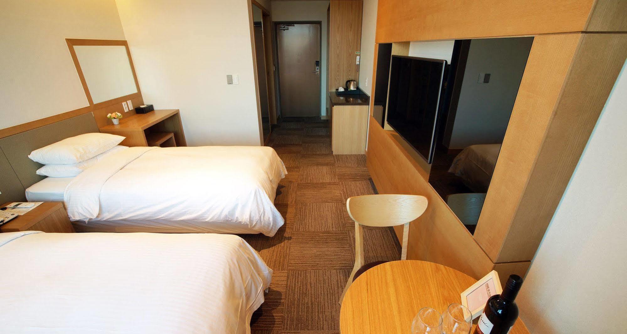 Jeju Poong Gyung Hotel Seogwipo Bagian luar foto
