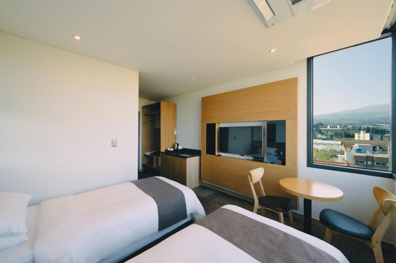 Jeju Poong Gyung Hotel Seogwipo Bagian luar foto