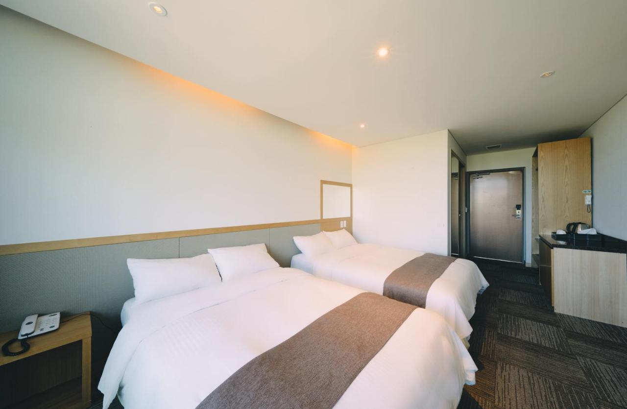 Jeju Poong Gyung Hotel Seogwipo Bagian luar foto