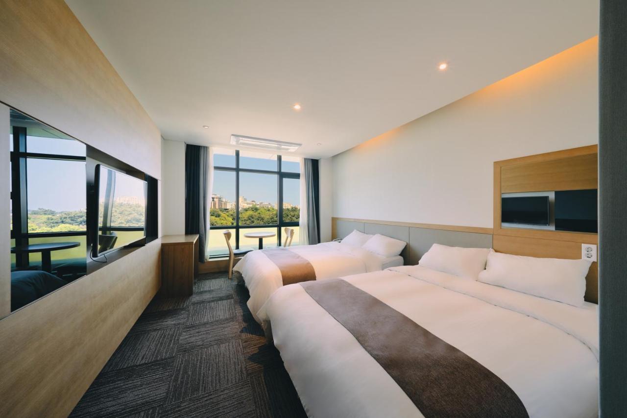 Jeju Poong Gyung Hotel Seogwipo Bagian luar foto