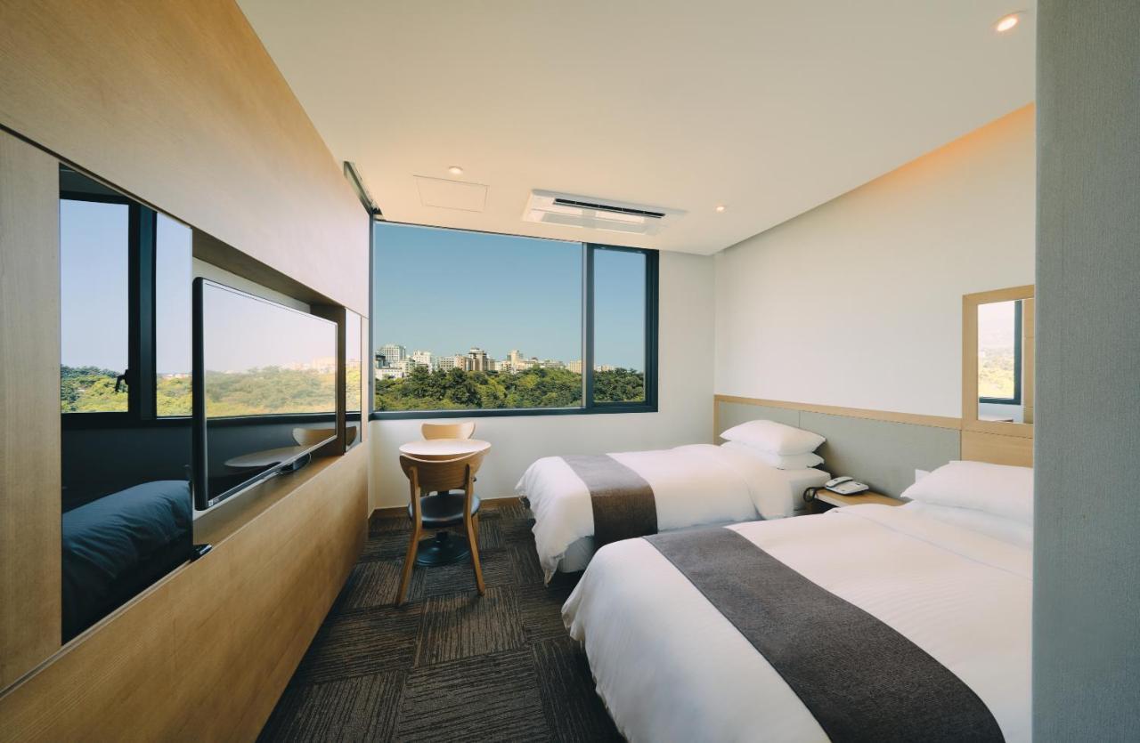 Jeju Poong Gyung Hotel Seogwipo Bagian luar foto