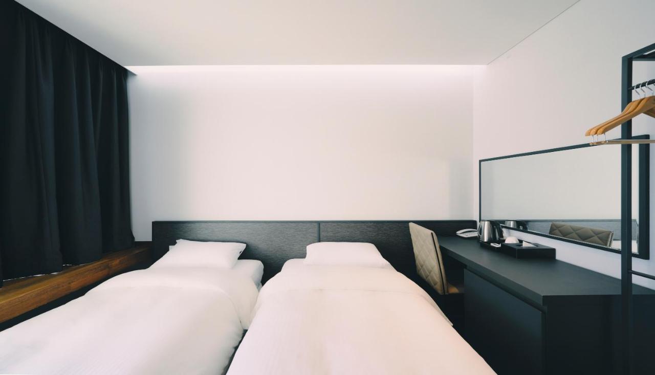 Jeju Poong Gyung Hotel Seogwipo Bagian luar foto