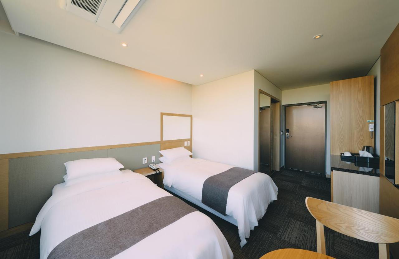 Jeju Poong Gyung Hotel Seogwipo Bagian luar foto