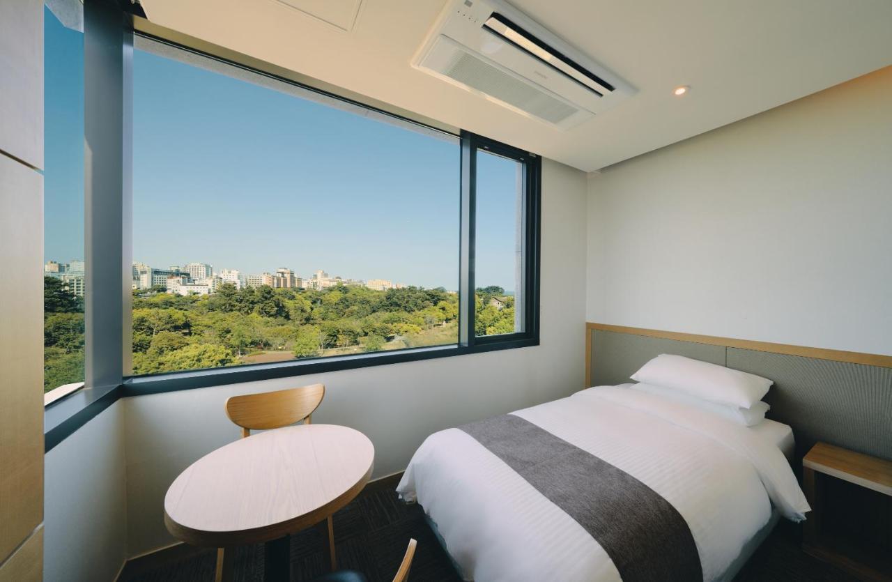 Jeju Poong Gyung Hotel Seogwipo Bagian luar foto