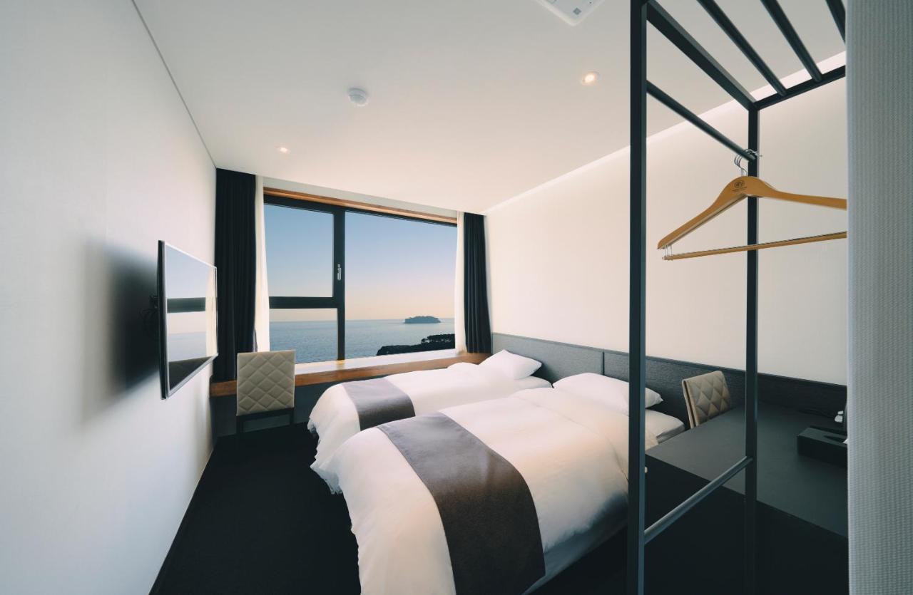 Jeju Poong Gyung Hotel Seogwipo Bagian luar foto
